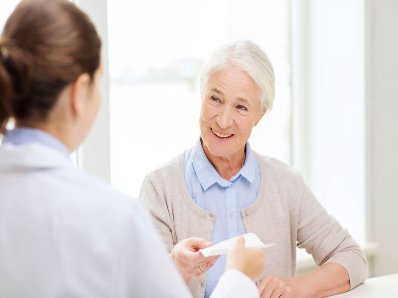 Elderly woman meeting with a senior living consultant